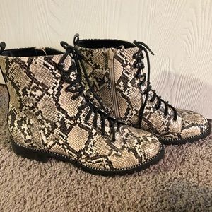 Snakeskin lace up boots